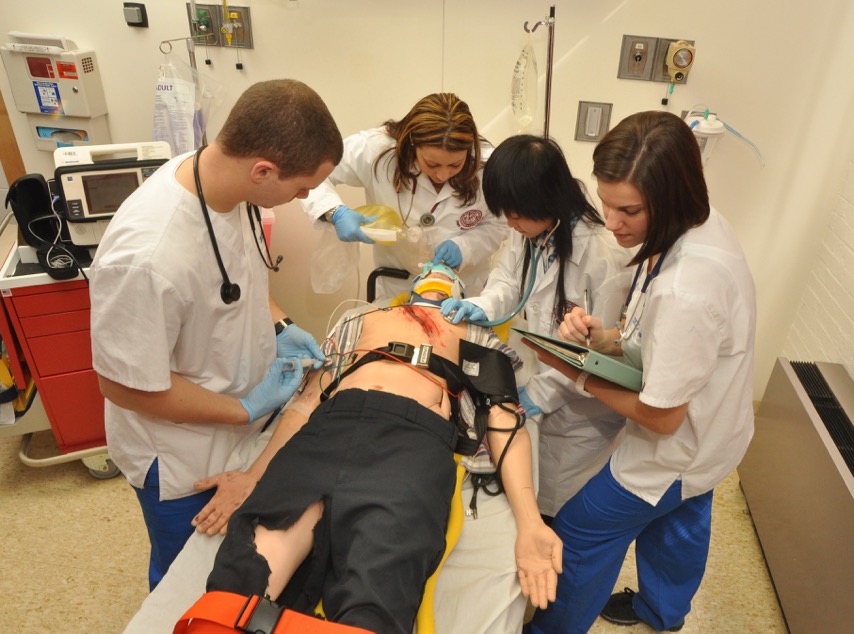 Health students treat a SIMS patient