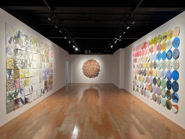 back end of the gallery with the reThreading the Surface exhibit