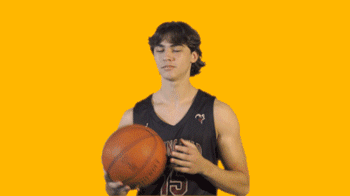 Travis Preston spins ball on fingertip