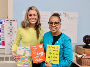 teachers holding Dr. Seuss books in early childhood classroom