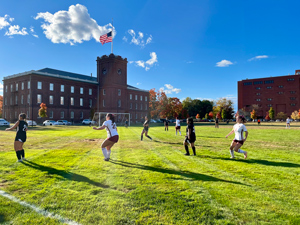 women's soccer team playing a home game