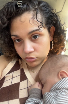Anastasia Padilla holding a baby
