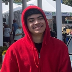 Christopher Rosado in hoodie