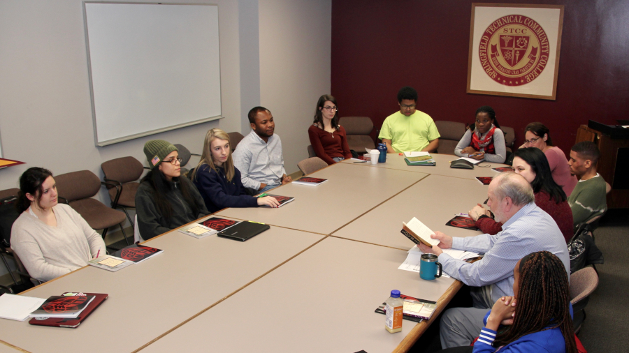 honors program students around meeting table