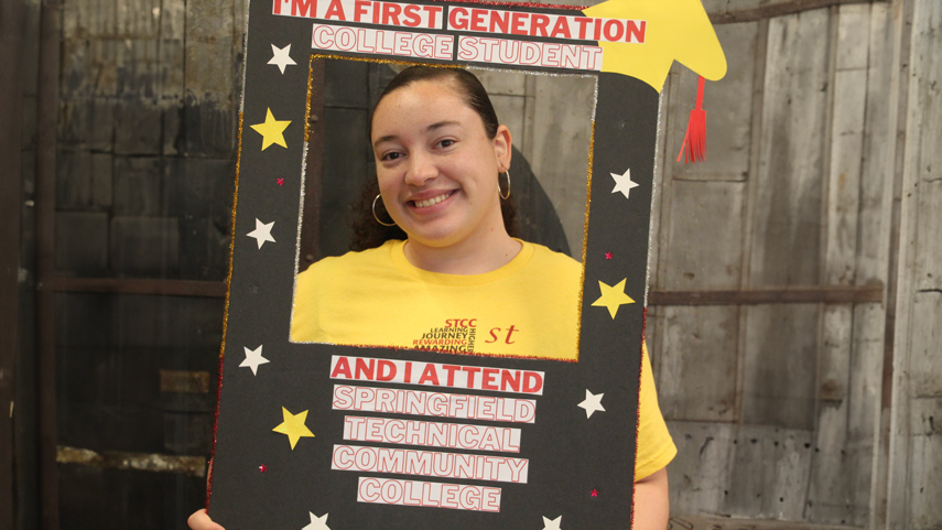 students inside of frame reading I am a first generation student and I attend STCC