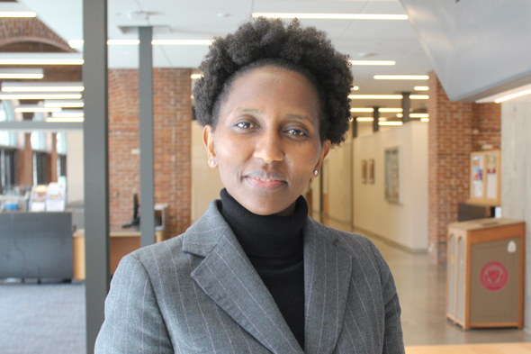 student in business suit and turtleneck