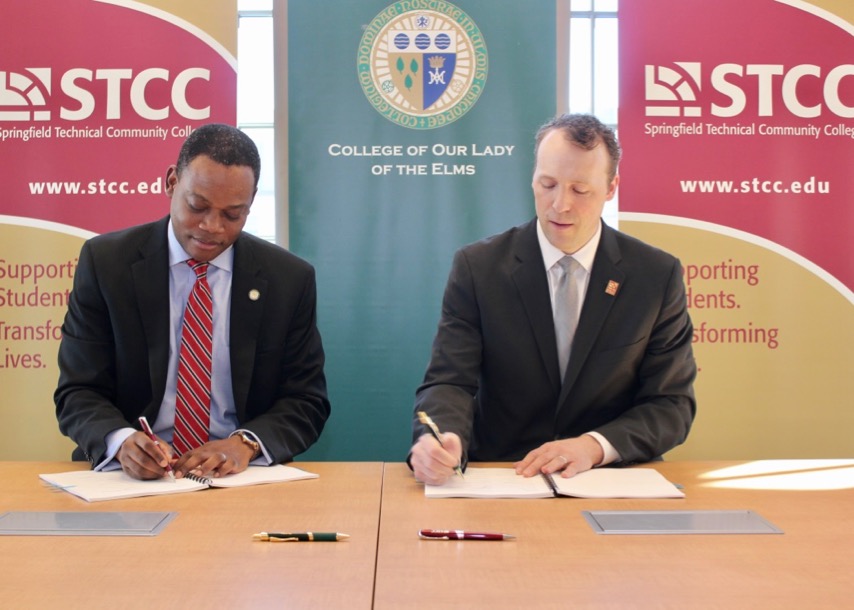 Presidents sign during ceremony for CIT transfer programs