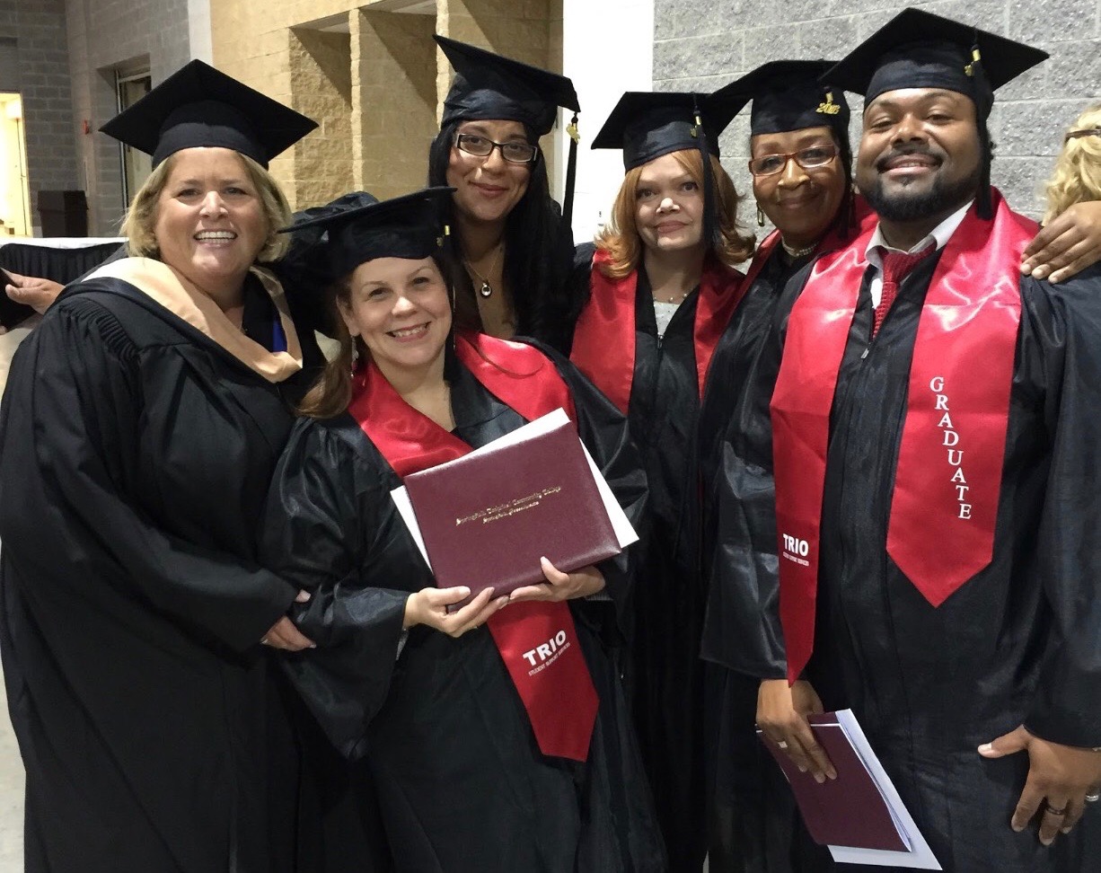 Customer Service graduates gather at graduation ceremony