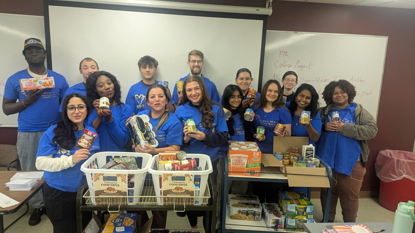 students volunteering at soup kitchen