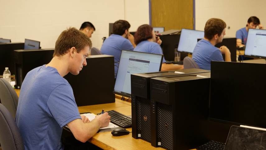 student working at computer in computer lab