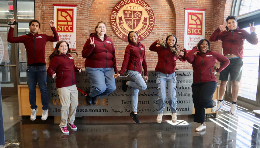 Student Ambassadors in middle of jumping