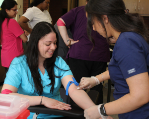 phlebotomy students practicing 