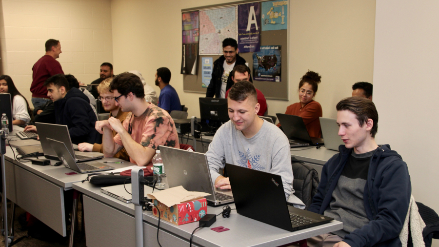 IT classroom full of students on laptops