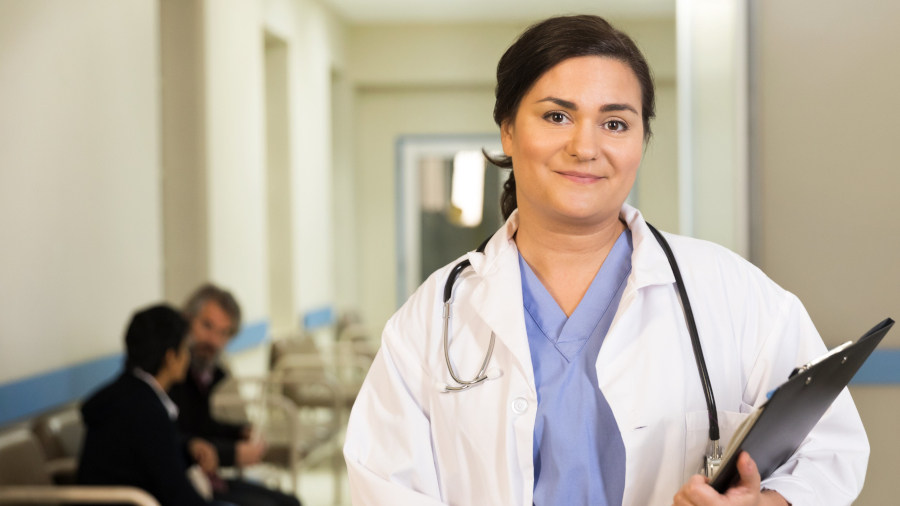 nurse holding a clipboard